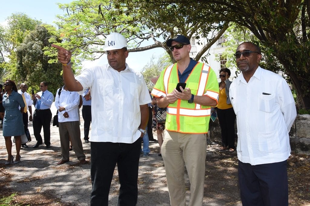 ourism Minister, Richard Sealy (left); Minister in the Office of the Prime Minister, Senator Darcy Boyce; and officials watch the start of the demolition phase at Sam Lord's Castle. (C.Pitt/BGIS)