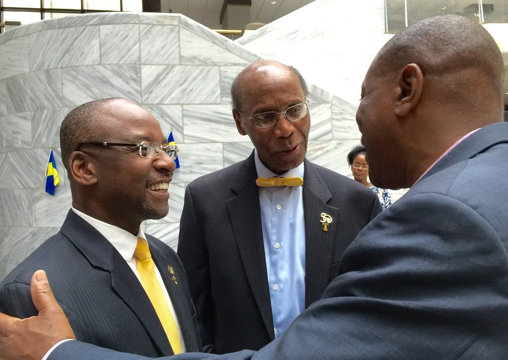 Culture Minister, Stephen Lashley being met by President of the Coalition, Tony Alleyne while at centre is Barbados' Honorary Counsul to Atlanta, Dr. Edward Layne. (GP)