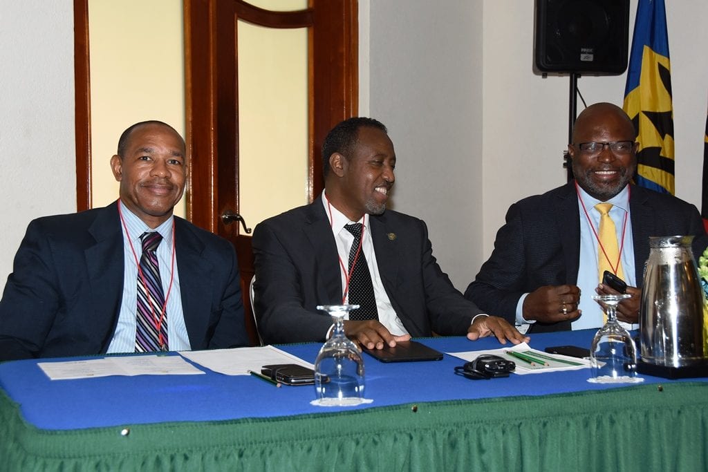 (Left to right) Secretary General of the Caribbean Postal Union, Allan Wayne Smith; UPU Director General, Bishar Hussein and Minister of Home Affairs, Adriel Brathwaite at the 3rd Council of Ministers of Postal Affairs Conference at the Accra Beach Resort. (C.Pitt/BGIS)