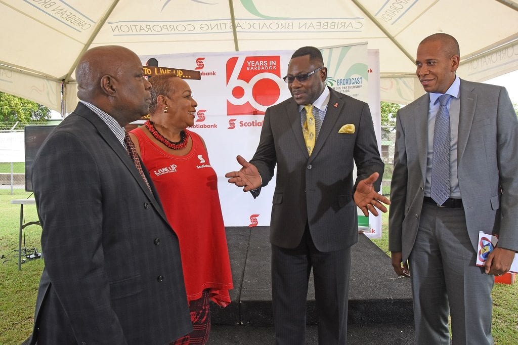 Social Care Minister, Steve Blackett has the ear of CBC General Manager, Doug Hoyte; CBMP Executive Director Dr. Allyson Leacock and Managing Director, Scotiabank, David Noel at the launch of Regional Testing Day 2016. (C.Pitt/BGIS)