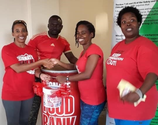 Workers Walk & Give To HIV Food Bank